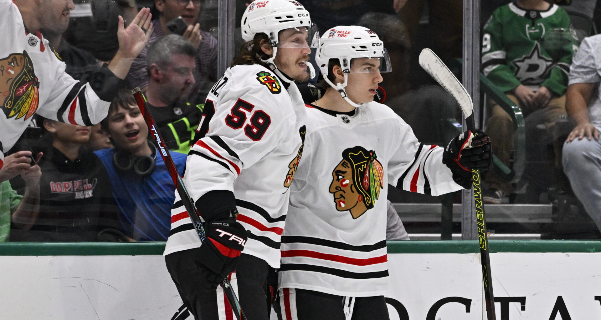 Chicago Blackhawks center Connor Bedard (98) and left wing Tyler Bertuzzi (59) at American Airlines Center.