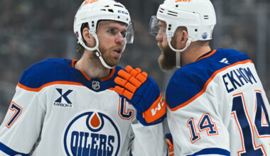 Edmonton Oilers center Connor McDavid (97) talks to defenseman Mattias Ekholm