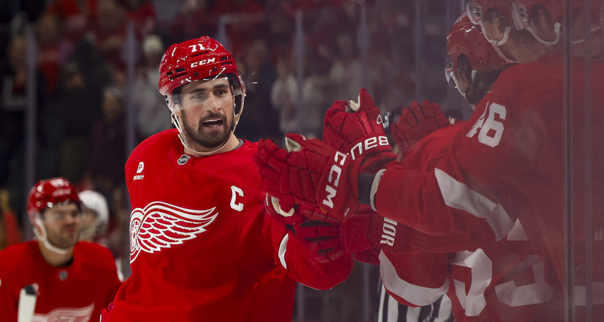 Red Wings center Dylan Larkin (71) receives congratulations