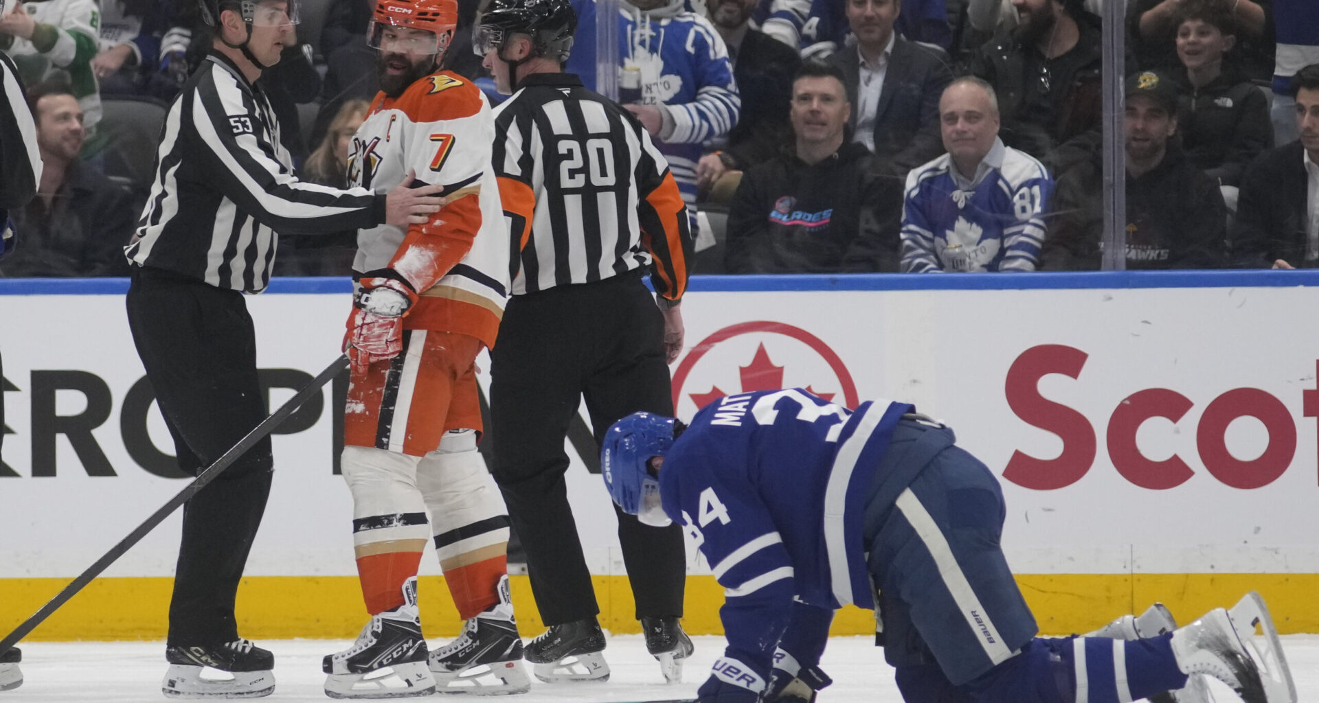Anaheim Ducks defenseman Radko Gudas (7) looks at an injured Toronto Maple Leafs forward Auston Matthews