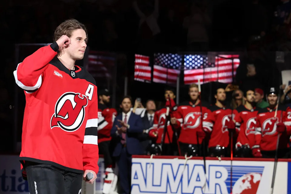 New Jersey Devils center Jack Hughes (86) is honored for Team USA’s gold medal winning performance at the 2026 Winter Olympics at Prudential Center.Ed Mulholland-Imagn Images