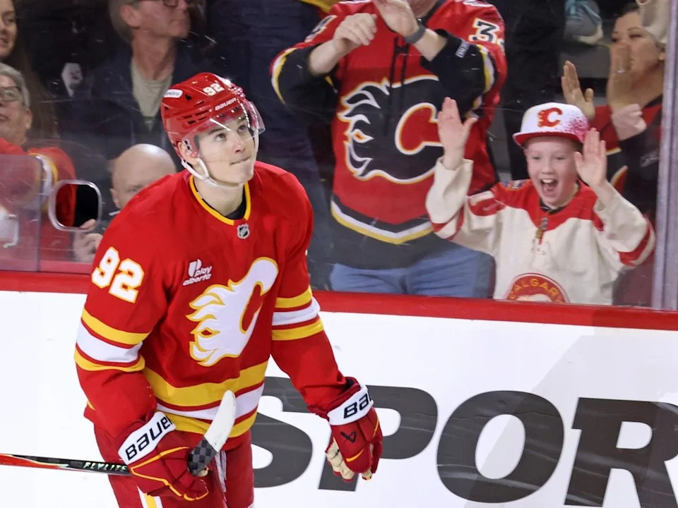  Fans cheer as Matvei Gridin skates past after his shoot out game winning goal against the St. Louis Blues during NHL action at the Scotiabank Saddledome in Calgary on Wednesday, March 18, 2026.Gavin Young/Postmedia
