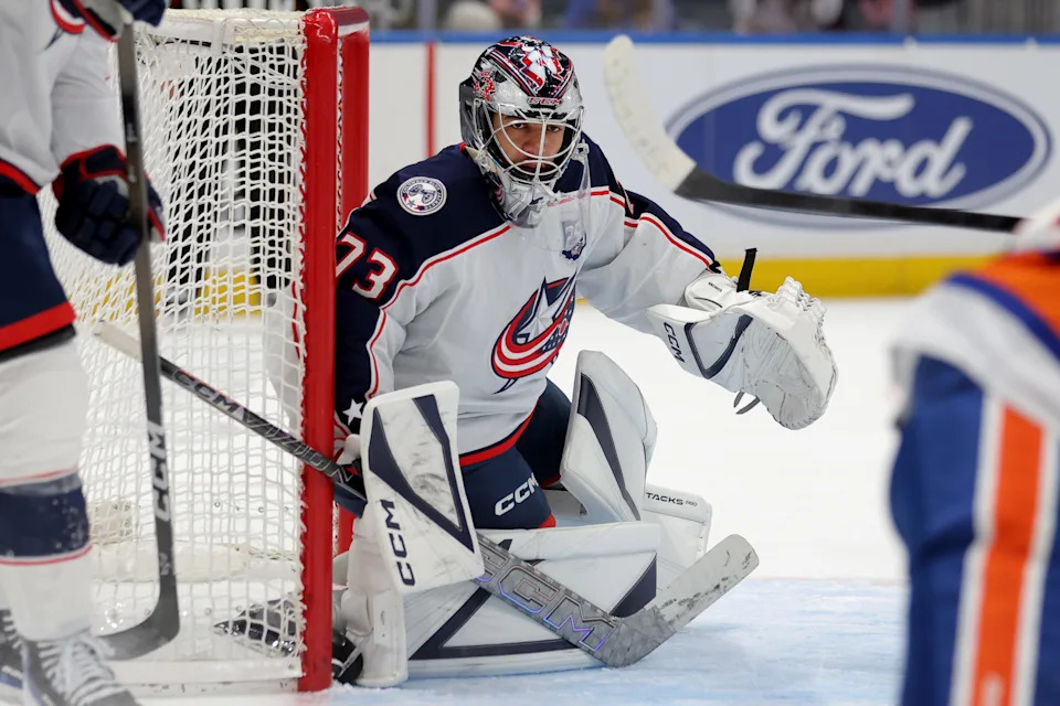 Mar 22, 2026; Elmont, New York, USA; Columbus Blue Jackets goaltender Jet Greaves (73) tends net against the New York Islanders during the second period at UBS Arena. Mandatory Credit: Brad Penner-Imagn Images