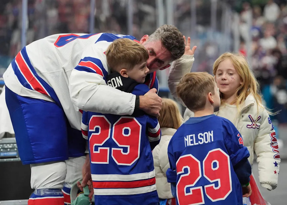 Brock Nelson celebrates with his family after capturing Olympic gold in Milan. Credit: Amber Searls