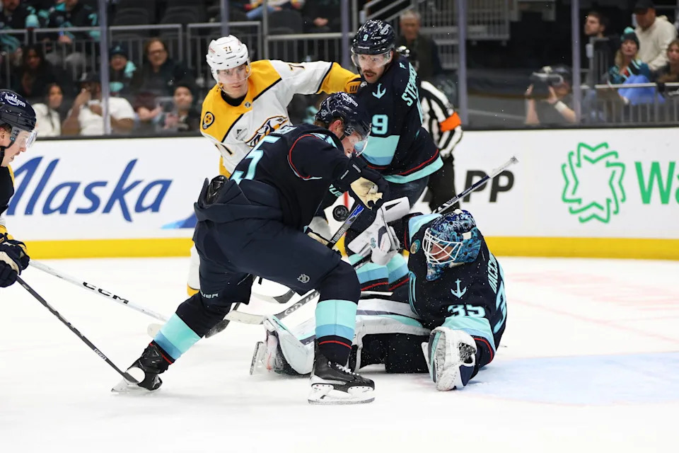 March 10: Joey Daccord and Ryan Lindgren Block A Shot. Photo by Candace Kludt | The Hockey News