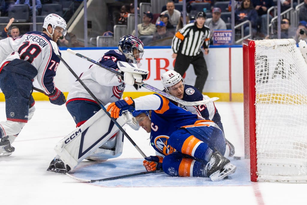 The Islanders’ Anders Lee (27) is in the goal past Columbus Blue Jackets goaltender Jet Greaves (73) in what was initially scored a goal but was reversed in the third period on March 22, 2026. Corey Sipkin for the NY POST