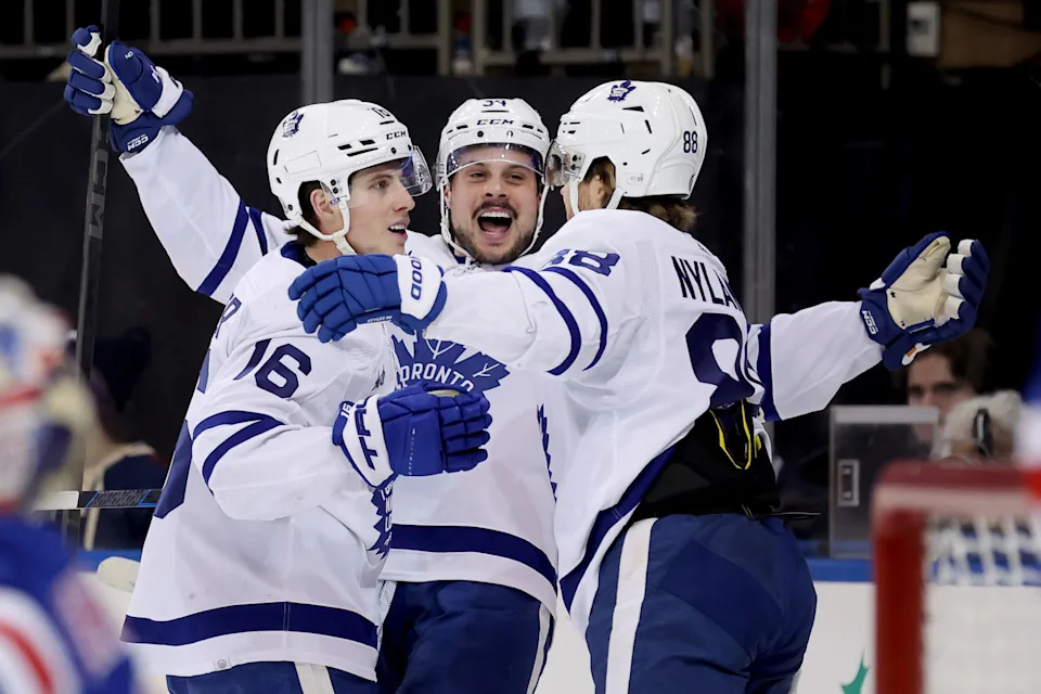 <p>Toronto Maple Leafs right wing Mitchell Marner (16) celebrates his goal with center Auston Matthews (34) and right wing William Nylander at Madison Square Garden. Mandatory Credit: Brad Penner-Imagn Images</p>