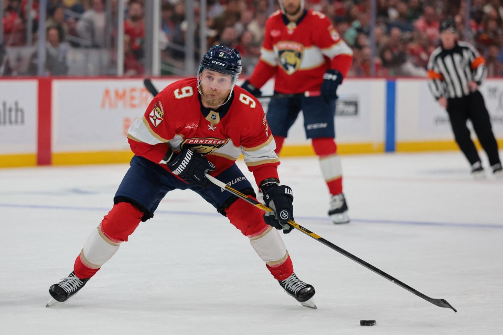 Florida Panthers center Sam Bennett (9) moves the puck against the Minnesota Wild.