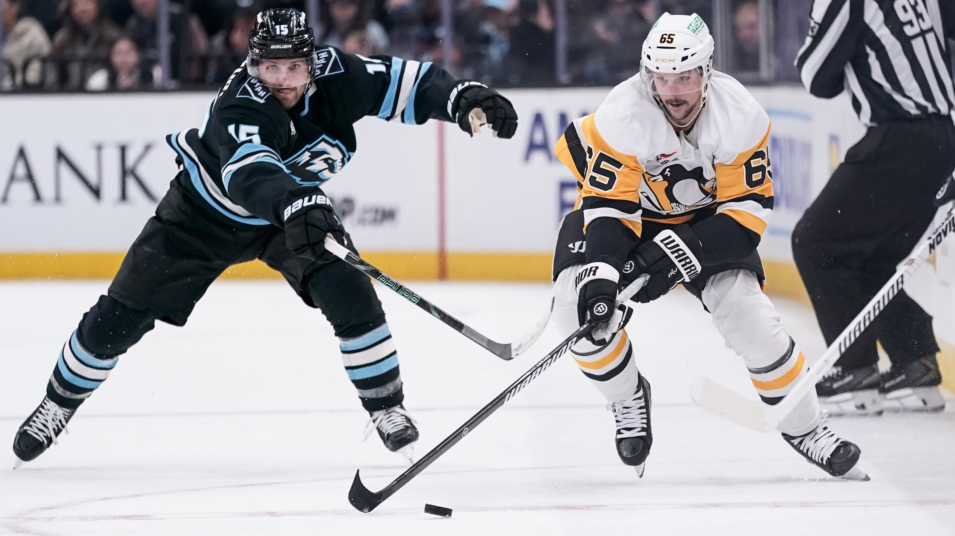 Erik Karlsson blows by the Mammoth's Alexander Kerfoot in the first period Saturday in Salt Lake City.