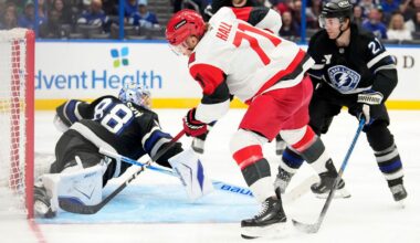 Tampa Bay Lightning goaltender Andrei Vasilevskiy (88) makes a save on a shot by Carolina Hurricanes left wing Taylor Hall (71) during an NHL hockey game Saturday, March 14, 2026, in Tampa, Fla. (AP Photo/Chris O'Meara)