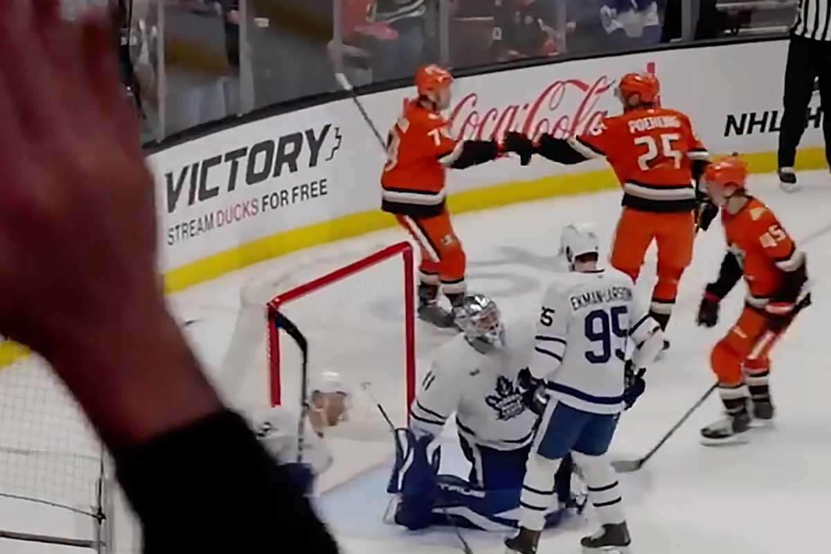 John Carlson celebrates a goal with his Anaheim Ducks teammates