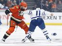 Radko Gudas of the Anaheim Ducks and Max Domi  of the Toronto Maple Leafs fight during the first period at Honda Center in Anaheim on Tuesday. 

