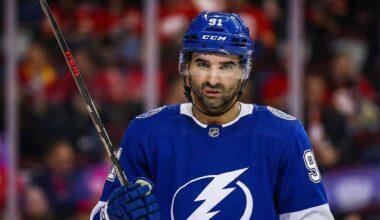 Calgary Flames center Nazem Kadri (91) wears a Tampa Bay Lightning jersey and helmet.