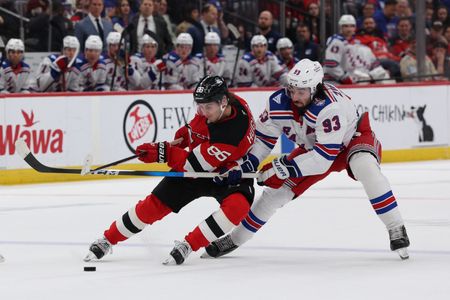 Jack Hughes Powers Devils Past Rangers with Hat Trick in Newark Victory