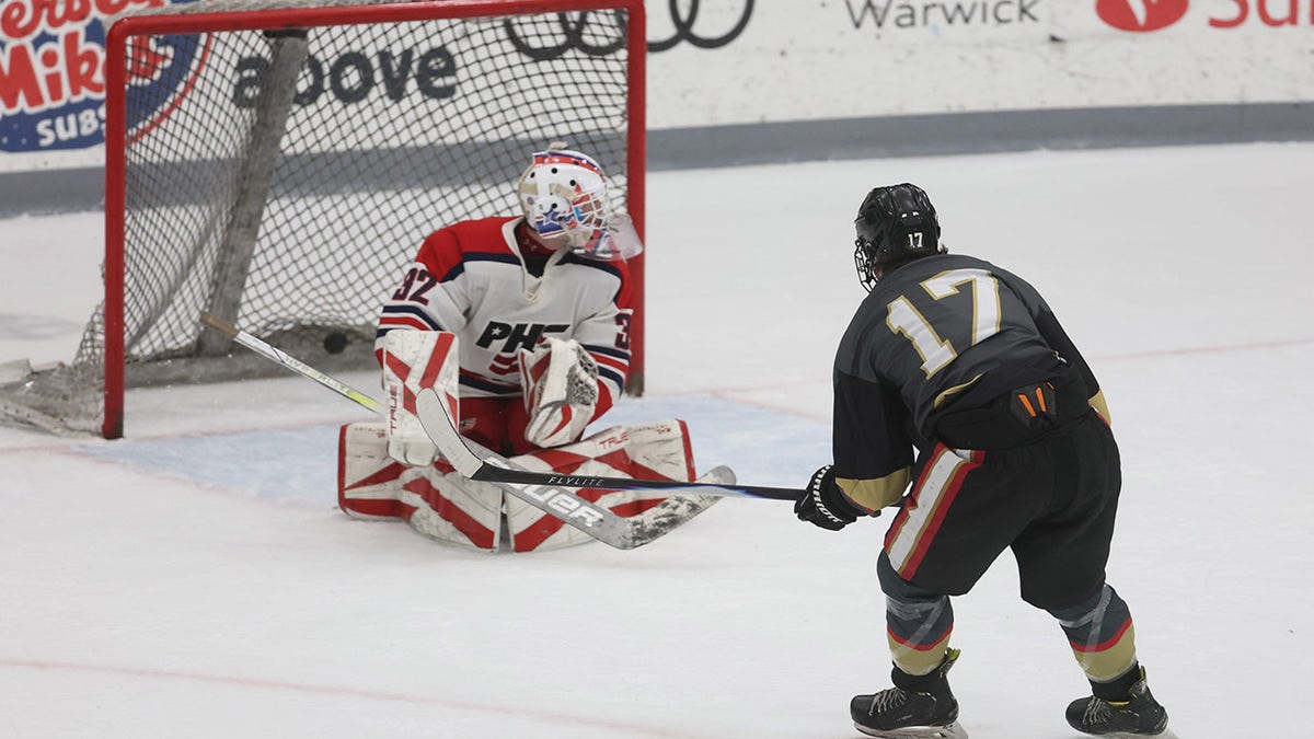 Colin Dorgan shoots and scores