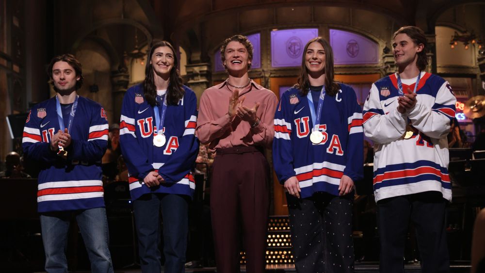 Quinn Hughes, Megan Keller, host Connor Storrie, Hilary Knight, and Jack Hughes during the SNL Monologue on Saturday, February 28, 2026