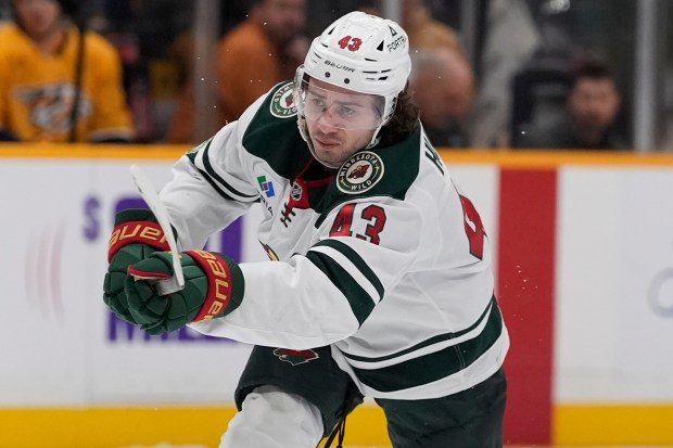 Minnesota Wild defenseman Quinn Hughes (43) plays during the first period of an NHL hockey game Wednesday, Feb. 4, 2026, in Nashville, Tenn. (AP Photo/George Walker IV)