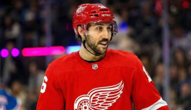 Photo illustration showing New York Rangers center Vincent Trocheck wearing a Detroit Red Wings jersey on the ice amid recent NHL trade rumors linking him to the team.