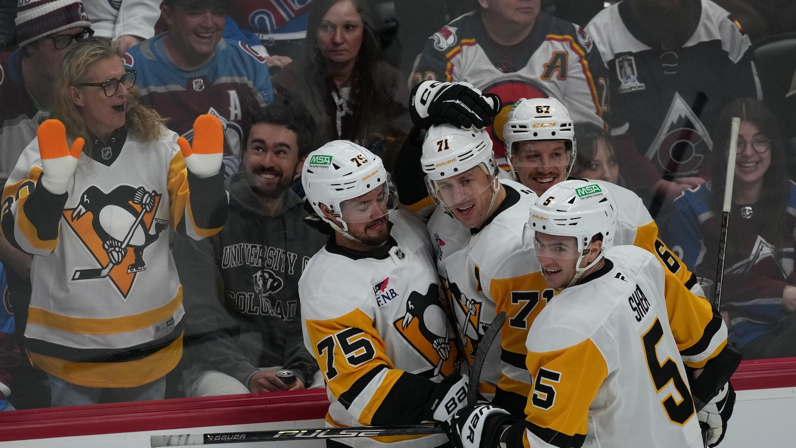 Malkin gets 2 goals in his return from suspension as the Penguins beat the NHL-leading Avalanche 7-2