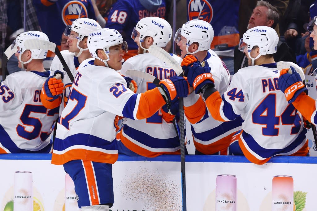 Anders Lee celebrates with teammates after scoring a third period goal during the Islanders’ road loss to the Sabres. NHLI via Getty Images