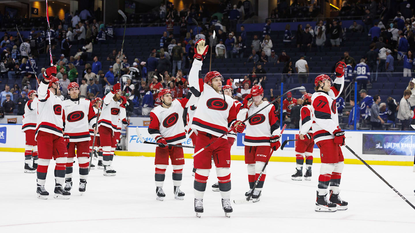 Mar 14, 2026; Tampa, Florida, USA; Carolina Hurricanes players wave to the crowd after the game against the Tampa Bay Lightning at Benchmark International Arena. Mandatory Credit: Morgan Tencza-Imagn Images