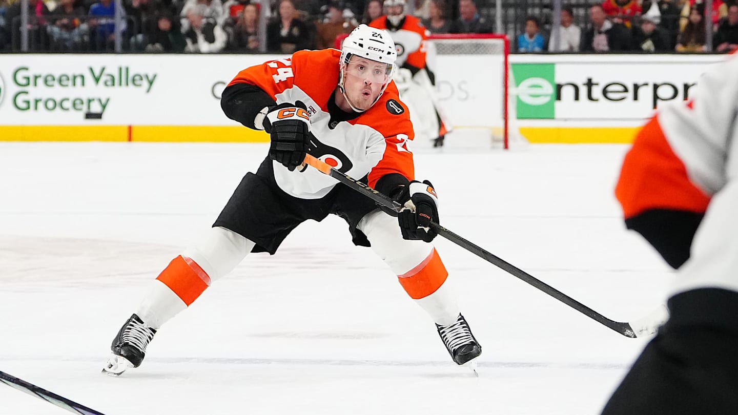 Jan 19, 2026; Las Vegas, Nevada, USA; Philadelphia Flyers defenseman Nick Seeler (24) passes the puck to Philadelphia Flyers right wing Travis Konecny (11) during a power play against the Vegas Golden Knights in the second period at T-Mobile Arena.