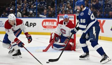 Mar 31, 2026; Tampa, Florida, USA; Tampa Bay Lightning right wing Nikita Kucherov (86) attempts to get past Montreal Canadian defensemen Kaiden Guhle (21) in the first period at Benchmark International Arena. Mandatory Credit: Jonathan Dyer-Imagn Images