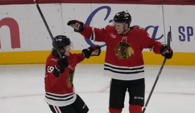 Oct 28, 2025; Chicago, Illinois, USA; Chicago Blackhawks defenseman Louis Crevier (46) celebrates his goal against the Ottawa Senators with Chicago Blackhawks left wing Tyler Bertuzzi (59) during the first period at United Center. Mandatory Credit: David Banks-Imagn Images