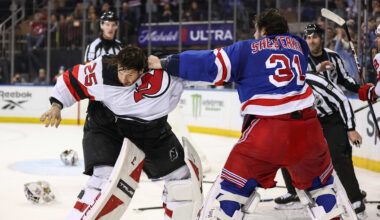 Mar 31, 2026; New York, New York, USA;  New York Rangers goaltender Igor Shesterkin (31) and New Jersey Devils goaltender Jacob Markstrom (25) fight in the third period at Madison Square Garden. Mandatory Credit: Wendell Cruz-Imagn Images