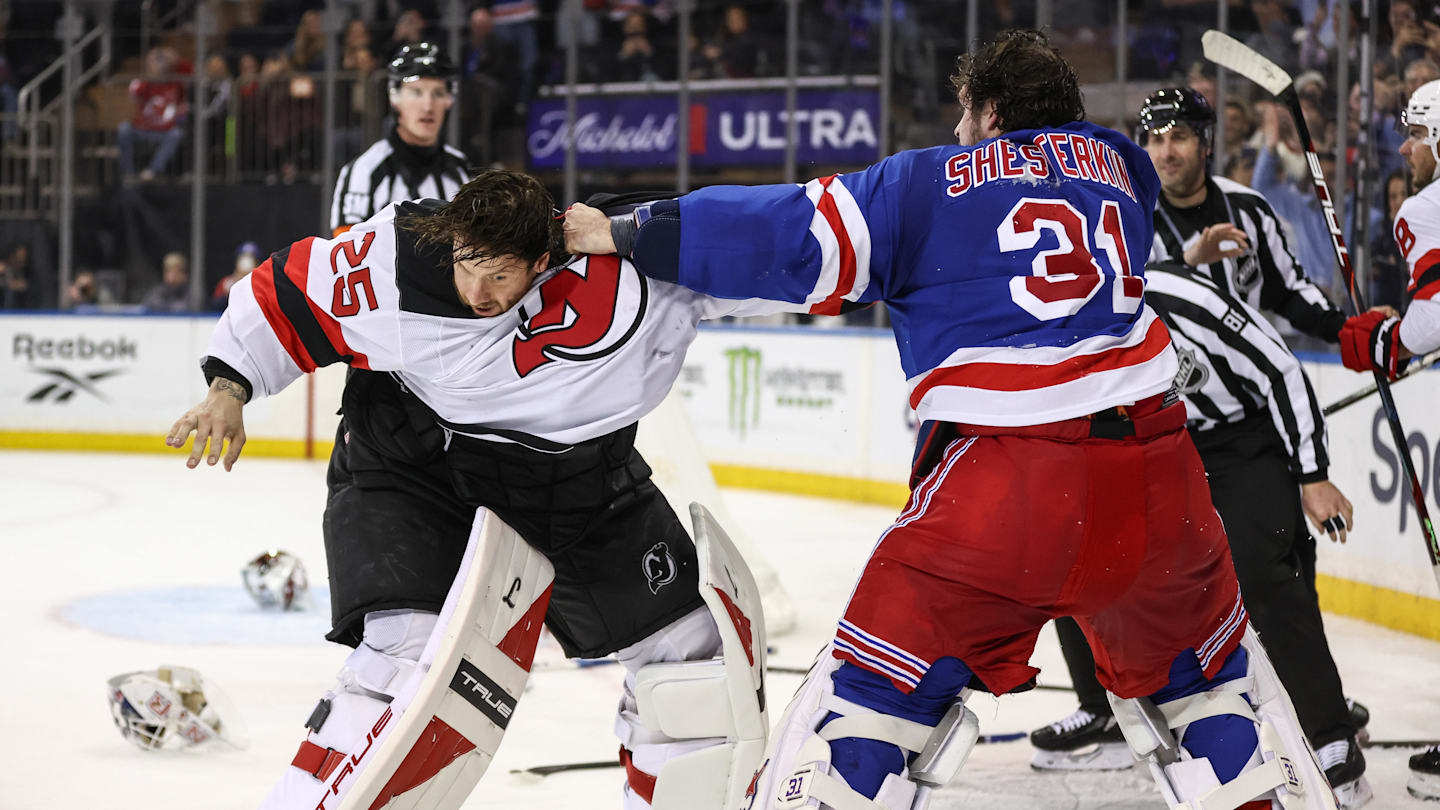 Mar 31, 2026; New York, New York, USA;  New York Rangers goaltender Igor Shesterkin (31) and New Jersey Devils goaltender Jacob Markstrom (25) fight in the third period at Madison Square Garden. Mandatory Credit: Wendell Cruz-Imagn Images