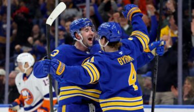 Mar 31, 2026; Buffalo, New York, USA;  Buffalo Sabres defenseman Bowen Byram (4) celebrates his open net goal with defenseman Mattias Samuelsson (23) during the third period against the New York Islanders at KeyBank Center. Mandatory Credit: Timothy T. Ludwig-Imagn Images