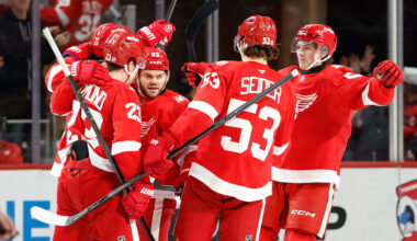 Mar 24, 2026; Detroit, Michigan, USA;  Detroit Red Wings center Dylan Larkin (71) receives congratulations from teammates after scoring in the third period against the Ottawa Senators at Little Caesars Arena. Mandatory Credit: Rick Osentoski-Imagn Images