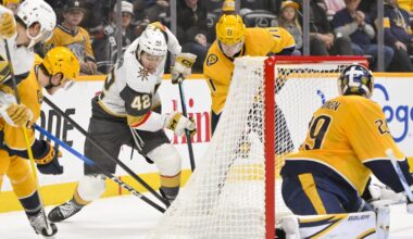 Mar 21, 2026; Nashville, Tennessee, USA;  Vegas Golden Knights right wing Braeden Bowman (42), Nashville Predators defenseman Brady Skjei (76) and right wing Matthew Wood (71) battle for the puck behind the net during the third period at Bridgestone Arena. Mandatory Credit: Steve Roberts-Imagn Images