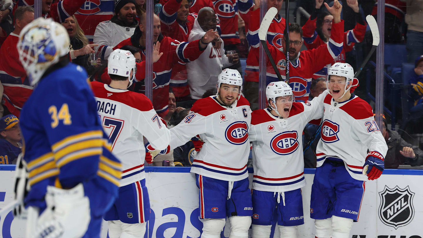 Jan 31, 2026; Buffalo, New York, USA;  Montréal Canadiens right wing Cole Caufield (13) celebrates his second goal of the game with teammates during the third period against the Buffalo Sabres at KeyBank Center. Mandatory Credit: Timothy T. Ludwig-Imagn Images