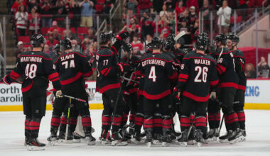 Apr 2, 2026; Raleigh, North Carolina, USA;  Carolina Hurricanes players celebrate their victory against the Columbus Blue Jackets at Lenovo Center. Mandatory Credit: James Guillory-Imagn Images
