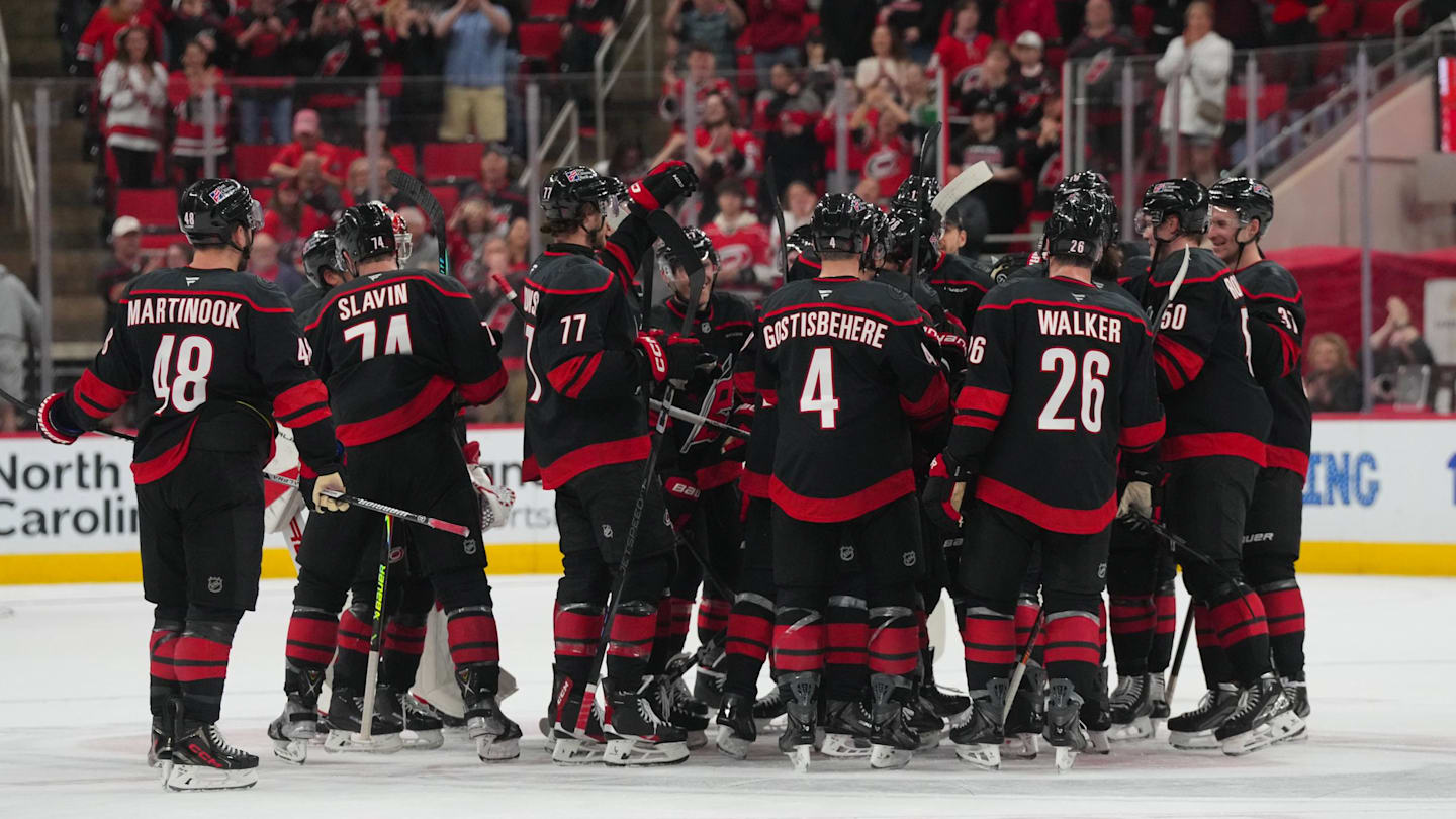 Apr 2, 2026; Raleigh, North Carolina, USA;  Carolina Hurricanes players celebrate their victory against the Columbus Blue Jackets at Lenovo Center. Mandatory Credit: James Guillory-Imagn Images