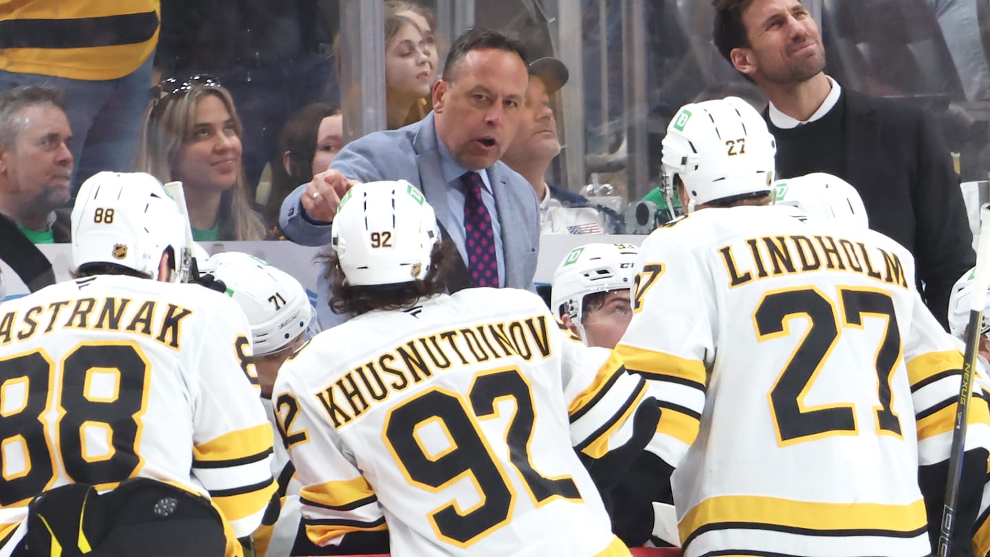 Mar 8, 2026; Pittsburgh, Pennsylvania, USA;  Boston Bruins head coach Marco Sturm (middle) talks to his team against the Pittsburgh Penguins during the third period at PPG Paints Arena. Mandatory Credit: Charles LeClaire-Imagn Images