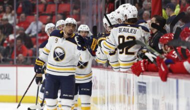 Feb 22, 2018; Detroit, MI, USA; Buffalo Sabres left wing Evander Kane (9) celebrates with teammates after scoring a goal during the second period against the Detroit Red Wings at Little Caesars Arena. Mandatory Credit: Raj Mehta-Imagn Images