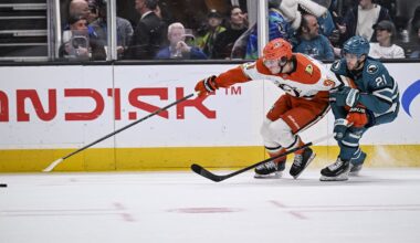 Apr 1, 2026; San Jose, California, USA; Anaheim Ducks center Leo Carlsson (91) and San Jose Sharks center Alexander Wennberg (21) go for the puck during the first period at SAP Center at San Jose. Mandatory Credit: Justine Willard-Imagn Images