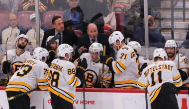 Apr 2, 2026; Sunrise, Florida, USA; Boston Bruins assistant coach Steve Spott speaks to Boston Bruins right wing David Pastrnak (88) during a timeout against the Florida Panthers in the third period at Amerant Bank Arena. Mandatory Credit: Sam Navarro-Imagn Images