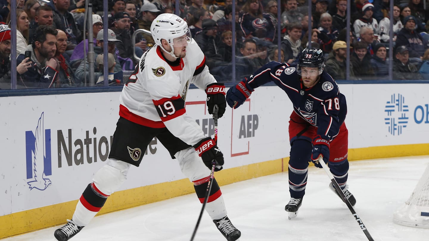 Jan 20, 2026; Columbus, Ohio, USA; Ottawa Senators right wing Drake Batherson (19) passes the puck as Columbus Blue Jackets defenseman Damon Severson (78) trails the play during the first period at Nationwide Arena. Mandatory Credit: Russell LaBounty-Imagn Images