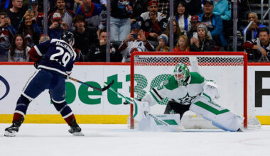 Mar 18, 2026; Denver, Colorado, USA; Colorado Avalanche center Nathan MacKinnon (29) shoots the puck wide of the net against Dallas Stars goaltender Jake Oettinger (29) in the shootout at Ball Arena. Mandatory Credit: Isaiah J. Downing-Imagn Images