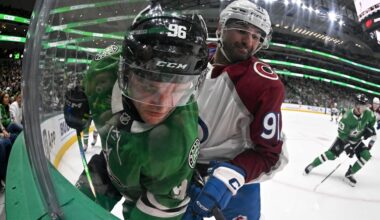 Apr 4, 2026; Dallas, Texas, USA; Colorado Avalanche center Nazem Kadri (91) checks Dallas Stars right wing Mikko Rantanen (96) during the second period at the American Airlines Center. Mandatory Credit: Jerome Miron-Imagn Images