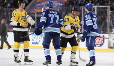 Feb 1, 2026; Tampa Bay, Florida, USA; Boston Bruins defenseman Nikita Zadorov (91) and right wing David Pastrnak (88) shake hands with Tampa Bay Lightning defenseman Victor Hedman (77) and left wing Brandon Hagel (38) following  the 2026 Stadium Series ice hockey game at Raymond James Stadium. Mandatory Credit: Kim Klement Neitzel-Imagn Images