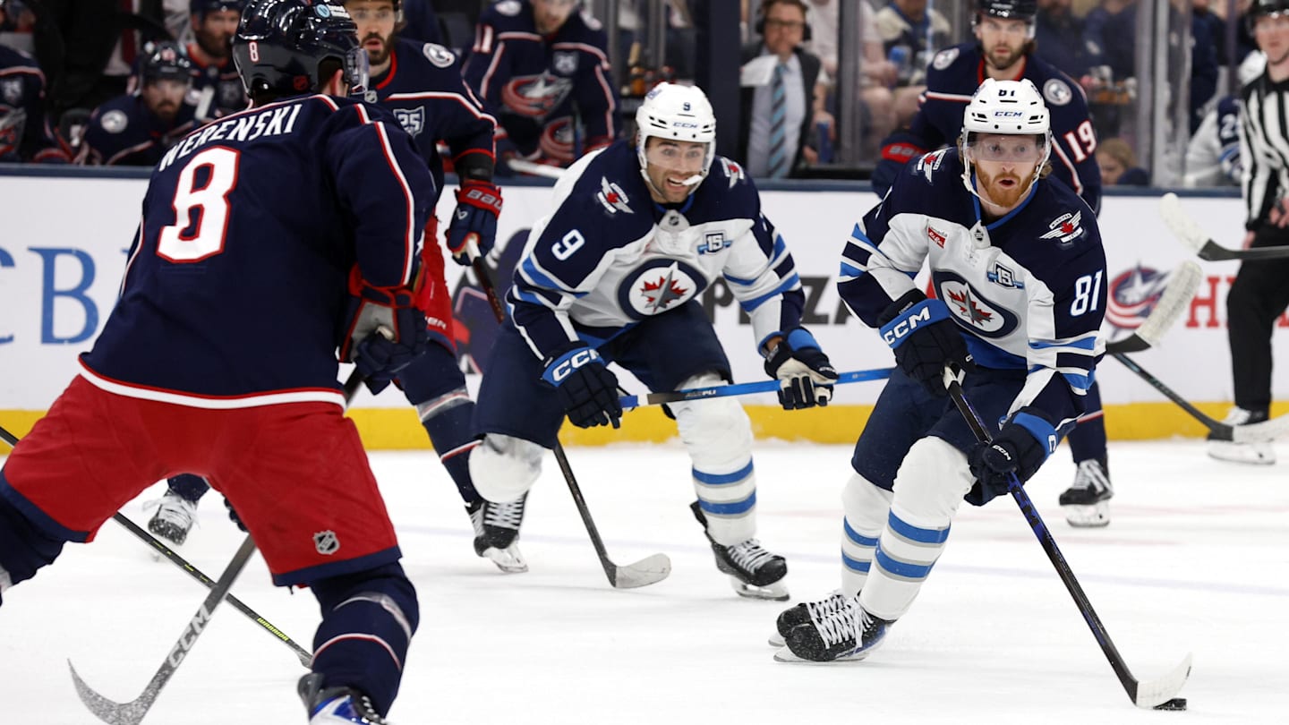 Apr 4, 2026; Columbus, Ohio, USA; Winnipeg Jets left wing Kyle Connor (81) looks to pass as Columbus Blue Jackets defenseman Zach Werenski (8) defends during the first period at Nationwide Arena. Mandatory Credit: Russell LaBounty-Imagn Images