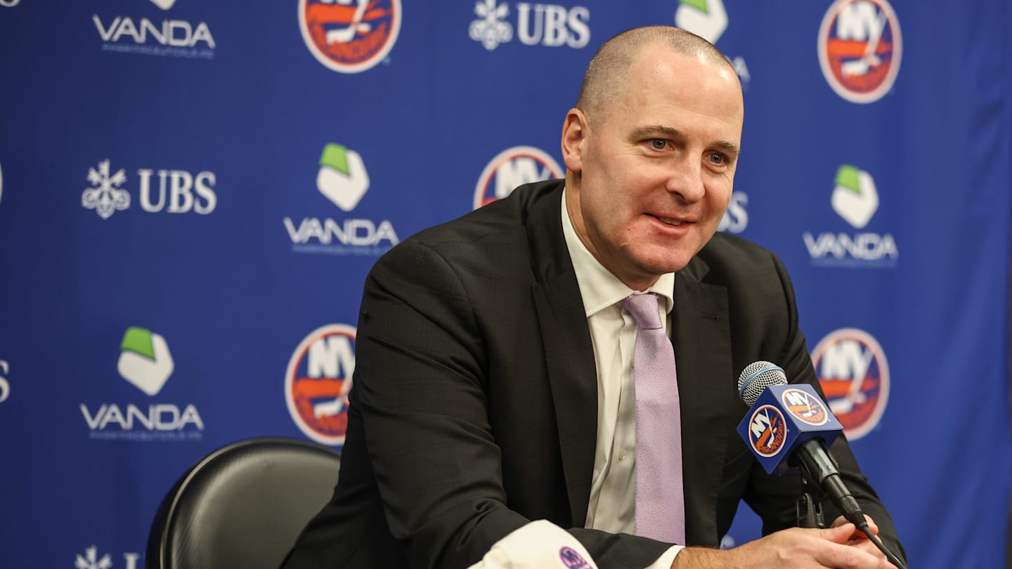 Nov 22, 2025; Elmont, New York, USA; New York Islanders General Manager Mathieu Darche speaks with fans at a pre-game event prior to the game against the St. Louis Blues at UBS Arena. Mandatory Credit: Wendell Cruz-Imagn Images