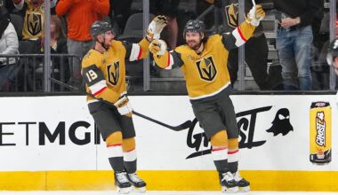 Mar 30, 2026; Las Vegas, Nevada, USA; Vegas Golden Knights defenseman Rasmus Andersson (4) celebrates with right wing Reilly Smith (19) after scoring a goal against the Vancouver Canucks during the second period at T-Mobile Arena. Mandatory Credit: Stephen R. Sylvanie-Imagn Images