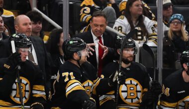 Oct 28, 2025; Boston, Massachusetts, USA; Boston Bruins head coach Marco Sturm talks with left wing Viktor Arvidsson (71) during the second period against the New York Islanders at TD Garden. Mandatory Credit: Winslow Townson-Imagn Images