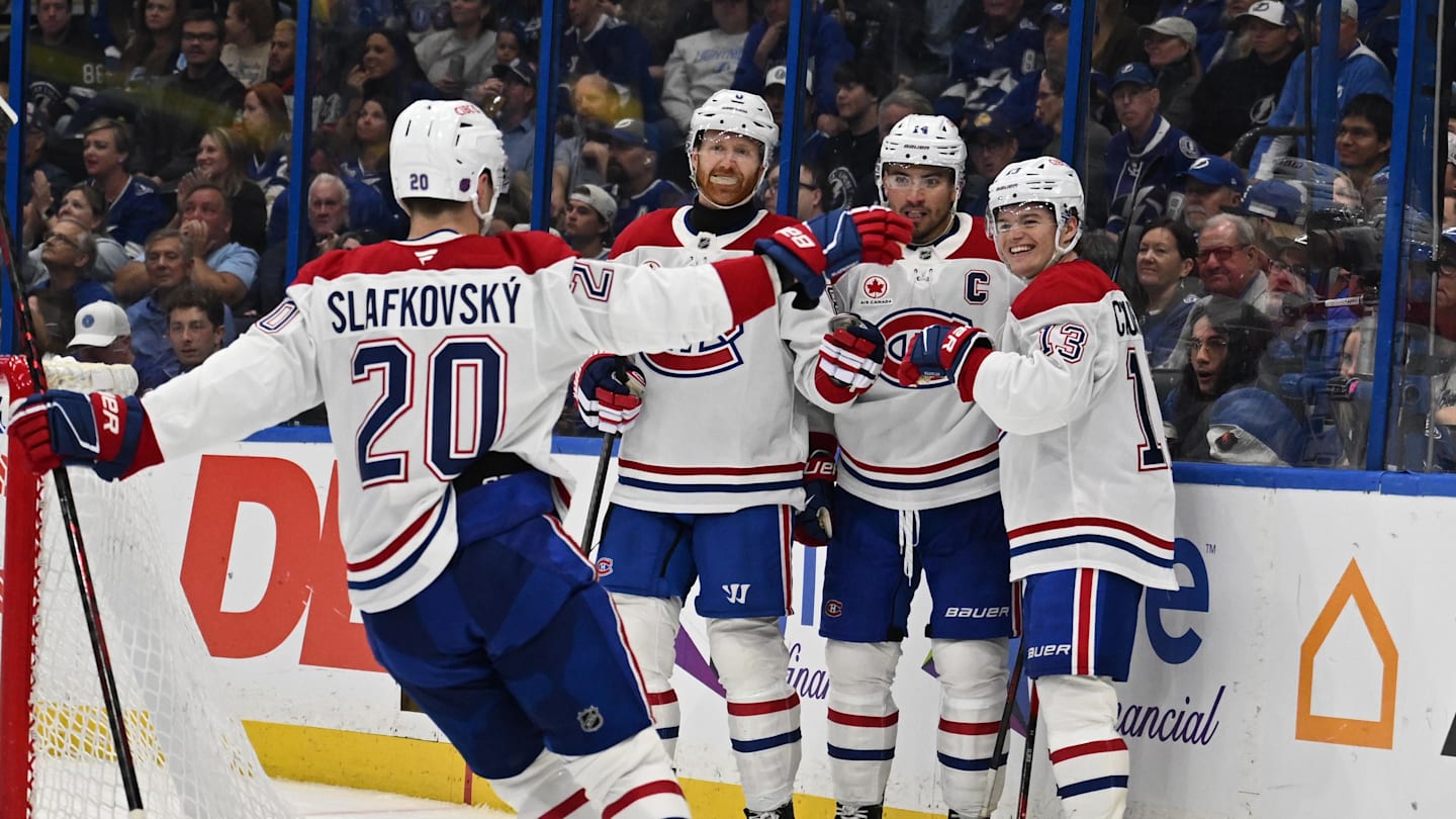 Mar 31, 2026; Tampa, Florida, USA;  Montreal Canadian right wing Cole Caufield (13) celebrates with his teammates after scoring a goal  in the second period against the Tampa Bay Lightning at Benchmark International Arena. Mandatory Credit: Jonathan Dyer-Imagn Images