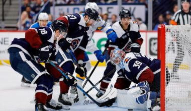 Apr 5, 2026; Denver, Colorado, USA; Colorado Avalanche goaltender MacKenzie Blackwood (39) covers the puck as center Jack Drury (18) and defenseman Brett Kulak (27) and defenseman Sam Malinski (70) defend in the third period against the St. Louis Blues at Ball Arena. Mandatory Credit: Isaiah J. Downing-Imagn Images